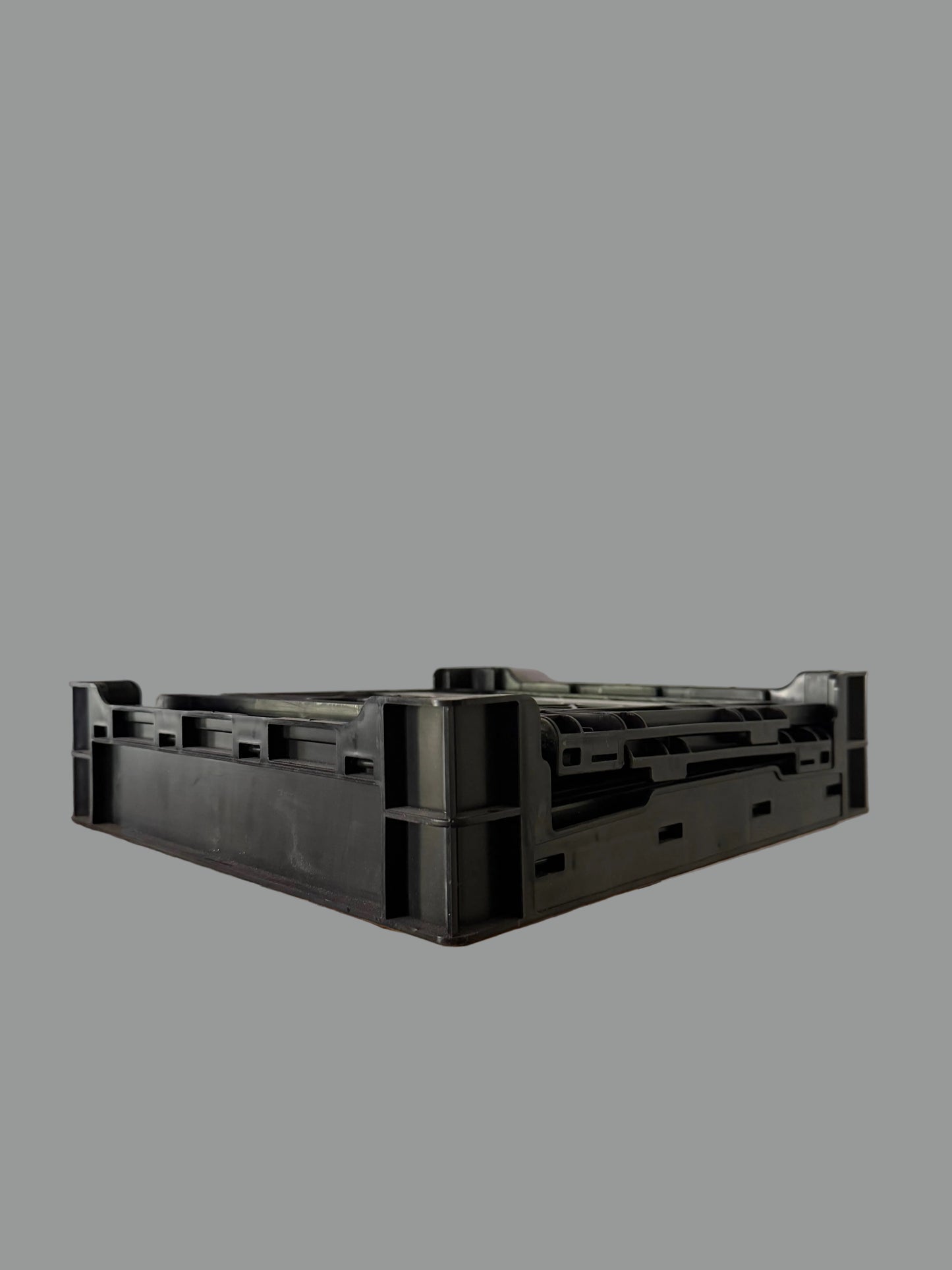 Rectangle Triangle RT milk crate for storage, featuring sturdy plastic construction and open grid design for easy organization.