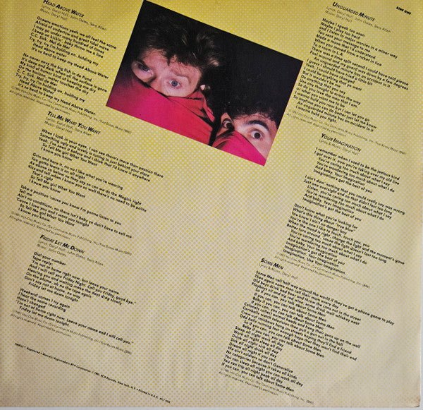 Close-up of Rectangle Triangle Private Eyes album cover featuring abstract geometric shapes and bold design elements.