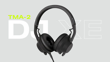 AIAIAI TMA-2 DJ XE headphones with over-ear design, black ear cups, and adjustable headband for DJ monitoring and mixing.