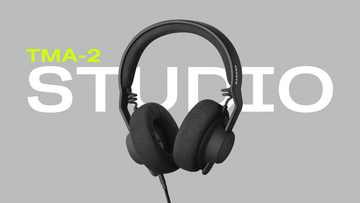 AIAIAI TMA-2 Studio headphones with black over-ear design and adjustable headband, detailed view of the high-quality audio gear