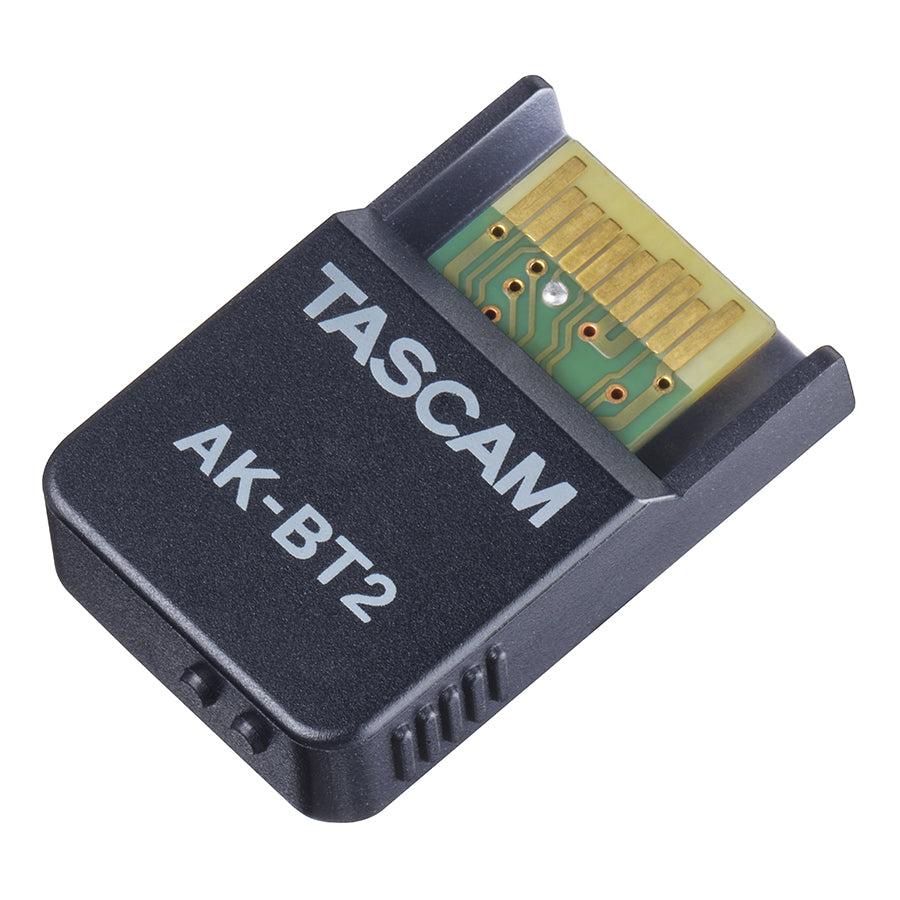 Tascam AK-BT2 Bluetooth adapter for portable recorders, front view showing compact design and connection ports.