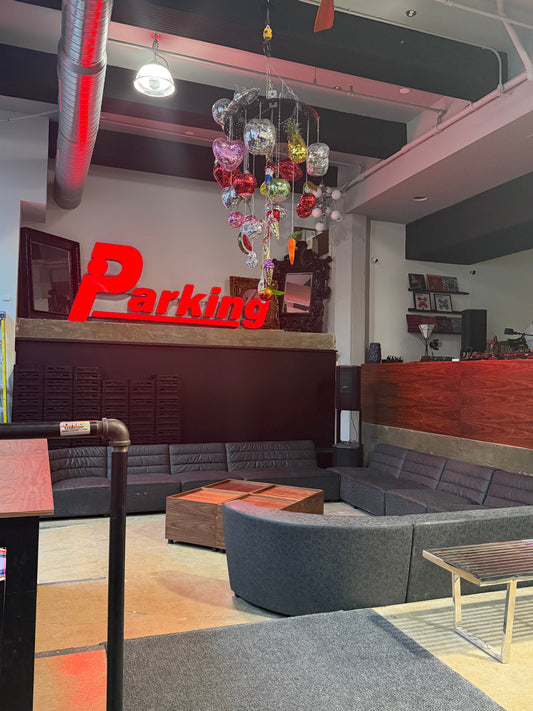 The original Parking nightclub sign at Rectangle Triangle, 1288-1290 Atateken