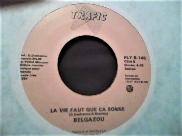 Belgazou & Mandeville* - Il Me Faut Sa Peau (Si Tu Me Touches) (7") (Very Good Plus (VG+)) | Rectangle Triangle | Media Condition: Very Good Plus (VG+)
Sleeve Condition: No Cover


 

Notes:



 

A.  Belgazou, 