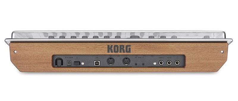 Decksaver cover for Korg Minilogue synthesizer, smoked and clear plastic, providing protection for the device.