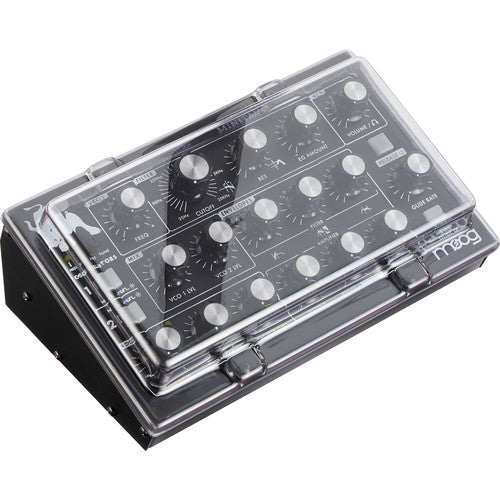 Decksaver cover for Moog Minitaur synthesizer, smoked and clear plastic, showing protective design for musical equipment.