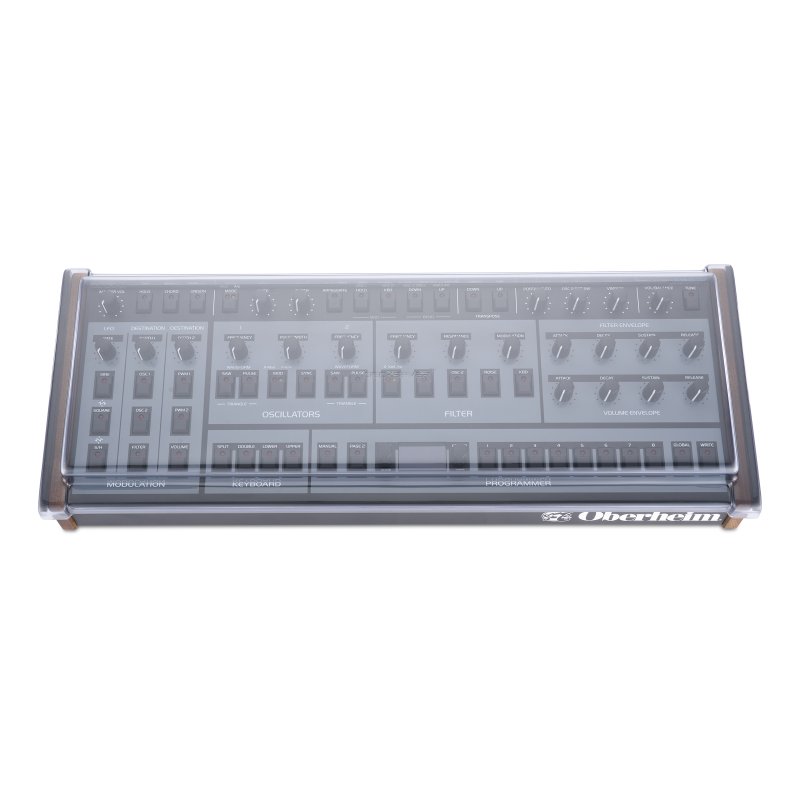Decksaver cover for Oberheim OB-X8 synthesizer, protective plastic case with custom fit, shown on a desktop.