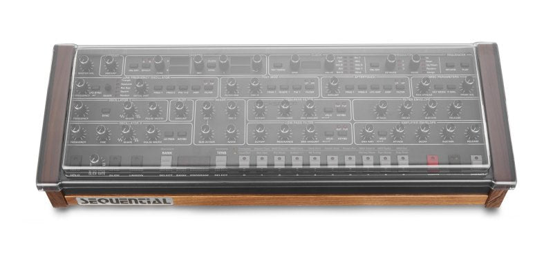 Decksaver cover for Sequential Prophet 6 desktop synthesizer, protective plastic case fitting the keyboard and controls.
