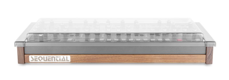Decksaver cover for Sequential Prophet 6 desktop synthesizer, protective plastic case for keyboard and controls.