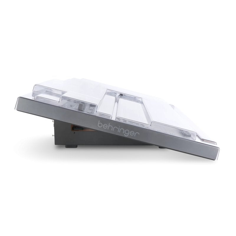 Decksaver cover for Behringer Wing pro audio mixer, clear protective plastic shield with custom fit for DJ and studio equipment.