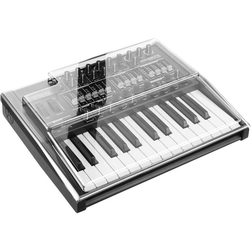 Decksaver cover for Arturia Mini Brute synthesizer mixer, smoked and clear plastic, designed to protect and store the device.