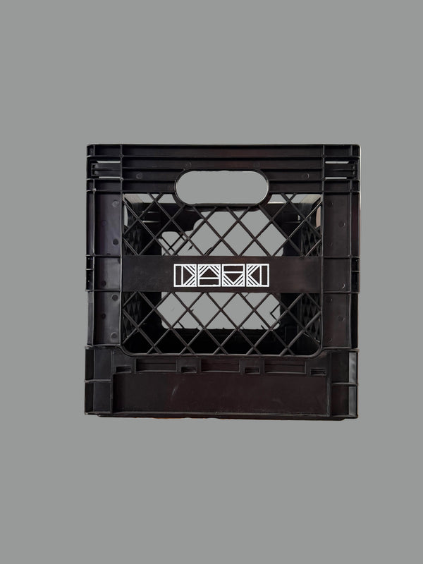 Rectangle Triangle RT milk crate for storage, featuring sturdy plastic construction and open grid design for versatile organization.