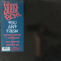 You Ain't Fresh T-shirt by Rectangle Triangle featuring bold graphic design on a black cotton shirt.