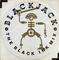Close-up of The Black Ink Mix by Rectangle Triangle showing a sleek, dark ink bottle with black ink inside.