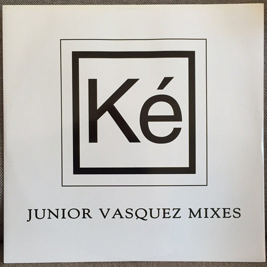 Rectangle Triangle Strange World Junior Vasquez Mixes vinyl record album cover featuring abstract artwork and vibrant colors.