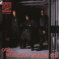 Rectangle Triangle Ooh, Whatcha Gonna Do album cover featuring bold geometric shapes and vibrant colors.