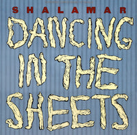 Rectangle Triangle Dancing In The Sheets vinyl record album cover with vibrant abstract artwork and bold typography.