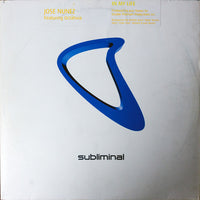 Rectangle Triangle's In My Life album cover featuring vibrant abstract geometric shapes in blue, yellow, and red.
