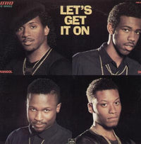 Rectangle Triangle "Let's Get It On" logo print on a white T-shirt, showcasing a stylish graphic design.