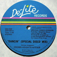 Rectangle Triangle Dancin vinyl record cover featuring vibrant abstract disco-themed artwork for the song "Dreaming A Dream (Goes Dancin)."
