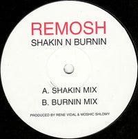 Rectangle Triangle Shakin N Burnin energy drink can with vibrant label design and bold branding, positioned on a plain background.