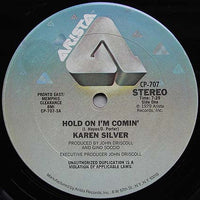 Rectangle Triangle Hold On I'm Comin' 2 album cover featuring vibrant artwork with bold typography and colorful abstract design.