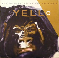 Rectangle Triangle album cover for "You Gotta Say Yes To Another Excess," featuring abstract geometric shapes and bold typography.
