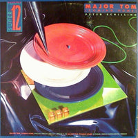 Rectangle Triangle Major Tom (Coming Home) 2 music album cover featuring abstract geometric shapes and vibrant colors.