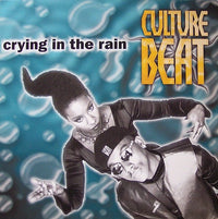 Rectangle Triangle Crying In The Rain album cover artwork featuring abstract rain and cloud illustrations in muted tones.