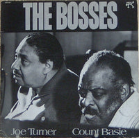 Rectangle Triangle The Bosses logo printed on a white background with bold black text and geometric shapes.