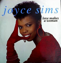 A woman with a loving expression, representing the "Love Makes A Woman" book by Rectangle Triangle, shown in a close-up image.