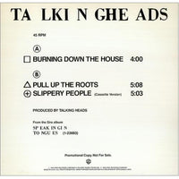 Rectangle Triangle cassette tape of Burning Down The House, Pull Up The Roots, and Slippery People with colorful cover art.
