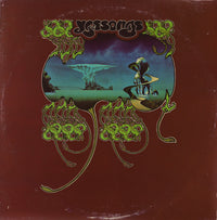 Rectangle Triangle Yessongs album cover featuring abstract geometric shapes and vibrant colors on a black background.