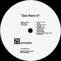 Zoo Rave II by Rectangle Triangle featuring vibrant geometric patterns on a colorful fabric background.