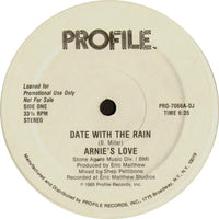 Rectangle Triangle Date With The Rain album cover artwork featuring abstract rain-inspired design in vibrant colors.