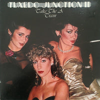 Rectangle Triangle Tuxedo Junction II Take The A Train jazz album cover featuring vibrant graphic artwork and vintage design.