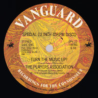 Rectangle Triangle "Turn The Music Up!" album cover featuring vibrant abstract art and bold typography.