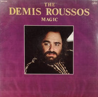 Rectangle Triangle Demis Roussos Magic album cover featuring vibrant, colorful artwork and bold typography.