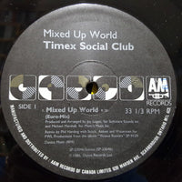 Cover art for "Mixed Up World" by Rectangle Triangle, featuring colorful abstract shapes and vibrant design elements.