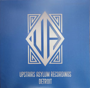 Cover image of "Detroit On The Move Vol. 1" music album by Rectangle Triangle, featuring urban-themed artwork and vibrant colors.