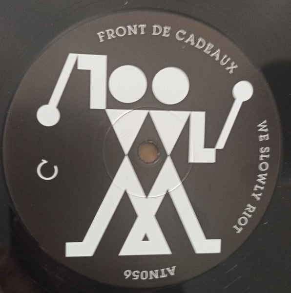 We Slowly Riot Front De Cadeaux
