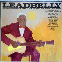 Close-up of Huddie Ledbetter's guitar, with his voice and piano in the background, from Rectangle Triangle album cover.