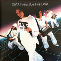 Close-up of a rectangle triangle branded "We Are DMX" on a sleek, modern product with a minimalist design.
