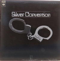 Silver Convention 2 jewelry piece by Rectangle Triangle featuring sleek silver design and geometric shapes.