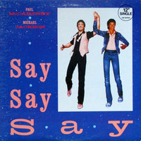 Rectangle Triangle Say Say Say 2 album cover with vibrant abstract geometric shapes and bold typography.