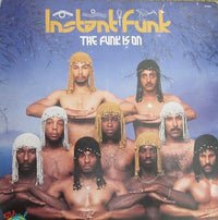 Rectangle Triangle The Funk Is On 2 album cover artwork featuring colorful geometric shapes and bold typography.