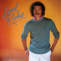 Rectangle Triangle Lionel Richie 2 collectible item with geometric shapes and vibrant colors on a white background.