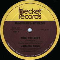 Rectangle Triangle Rock The Beat logo on a black background with bold white text and a colorful geometric design.