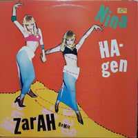 Rectangle Triangle Zarah Remix album cover featuring abstract geometric shapes in vibrant colors on a dark background.
