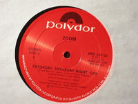 Rectangle Triangle Saturday Night music album cover featuring bold artwork and vibrant colors.