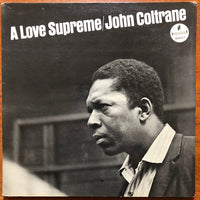A Love Supreme album cover by Rectangle Triangle, featuring vibrant abstract artwork with bold colors and geometric shapes.